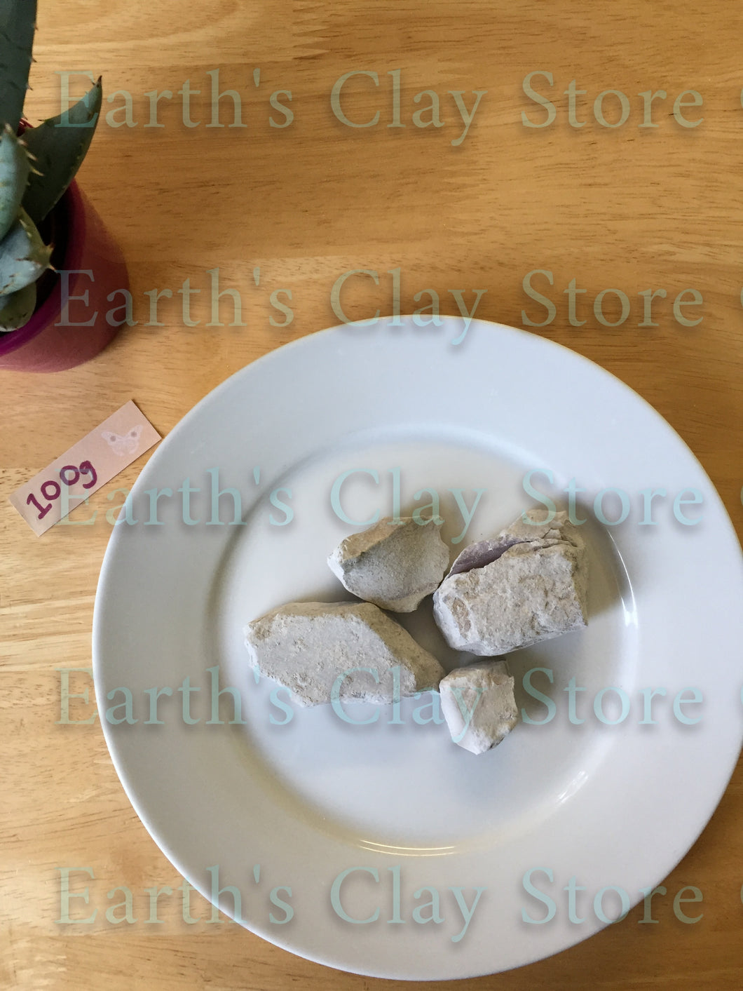 Premium Photo  Edible brown clay stone on a white background